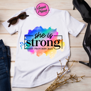 "She is Strong" short sleeve 100% cotton crew neck white tee with screen print.